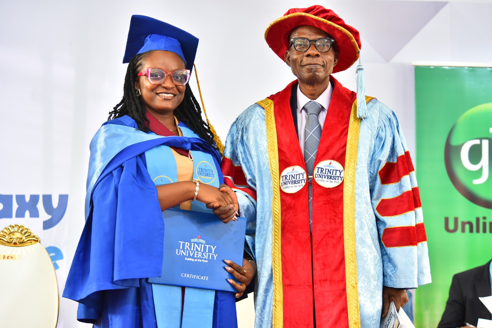 the vice chancellor, professor clement o. o. kolawole, in a hand shake with miss ifeoluwa oluwatofunmi adeyeye, graduating in mass communication with a perfect 5.0 cgpa